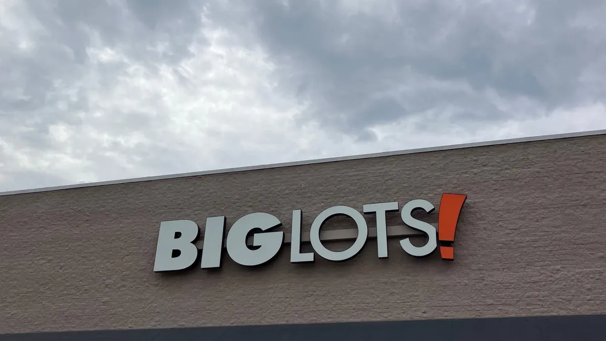 A Big Lots storefront with a cloudy gray sky